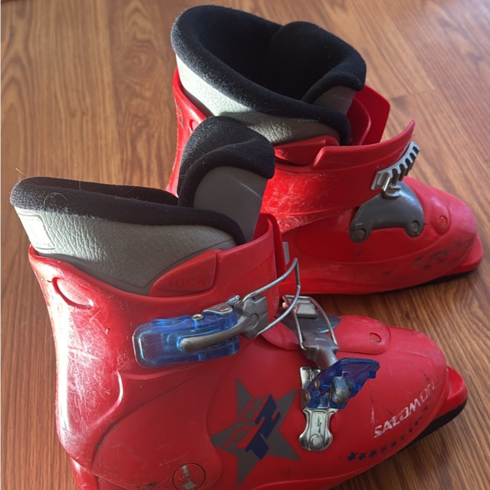 Salomon Vibrant Red Ski Boots with Black and Gray Details